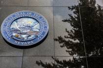 Benjamin Hager/Las Vegas Review-Journal The Nevada State Seal on the north side of the Legislat ...