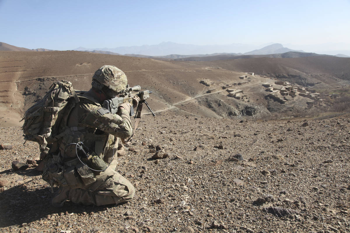 Getty Images U.S. Army infantryman provides security for soldiers patrolling through Dandarh v ...