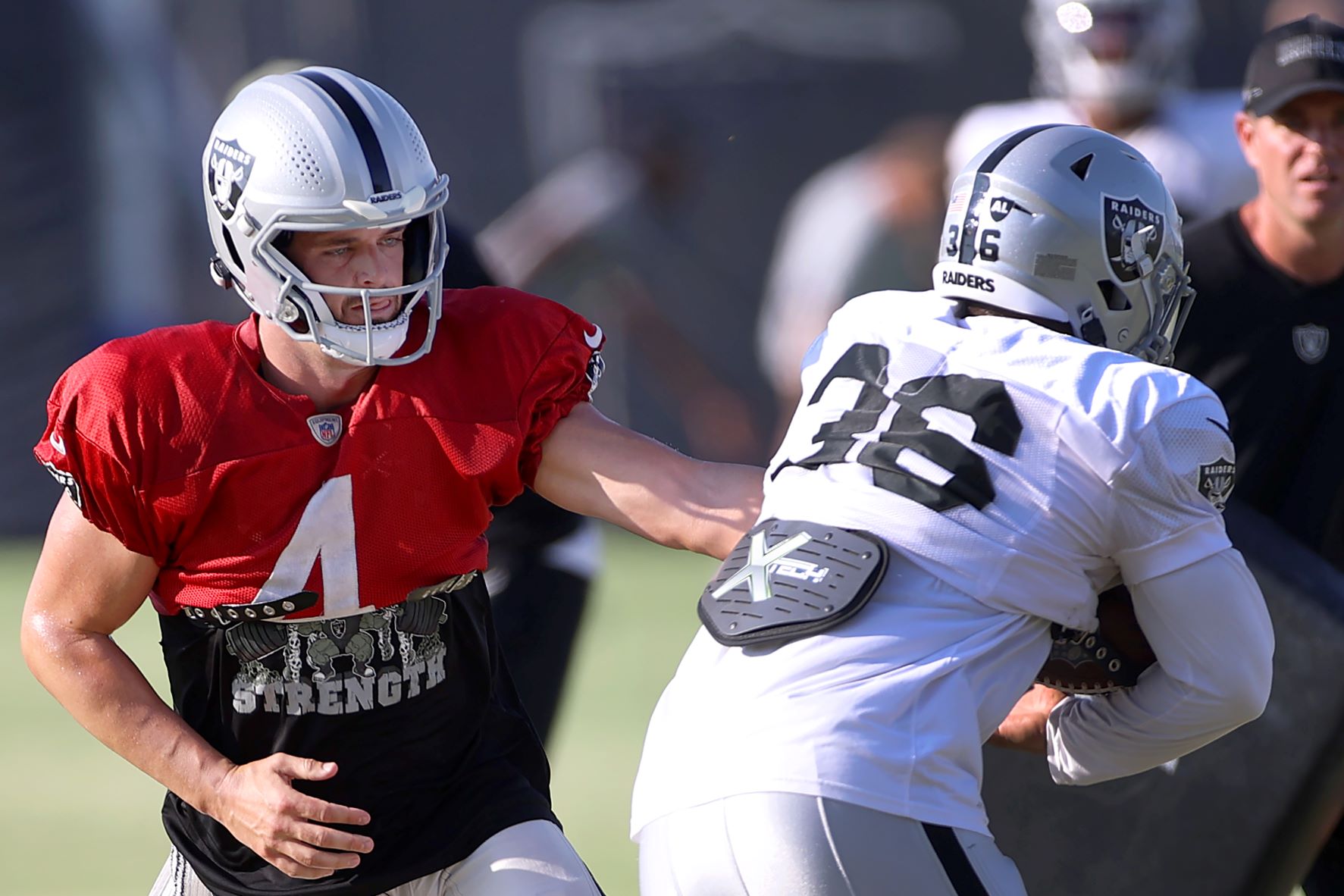 Oakland Raiders quarterback Derek Carr (4) during warms up drills