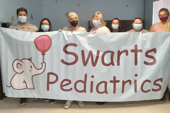 Selwyn Harris/Pahrump Valley Times Dr. Karen Swarts, center, is joined to her right by Pediatri ...