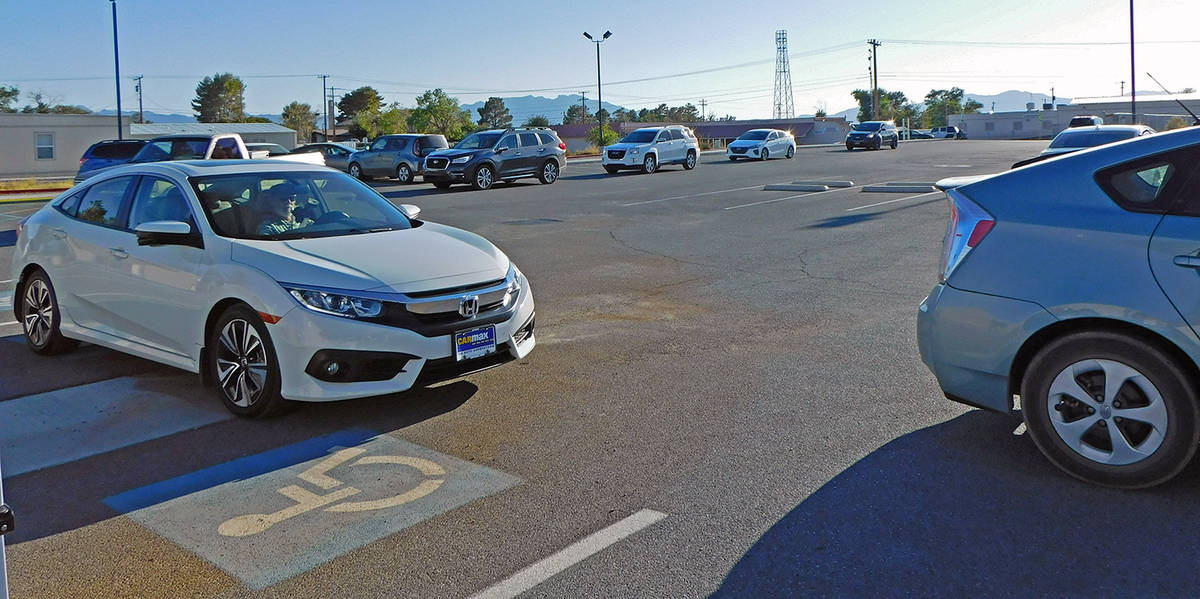 Robin Hebrock/Pahrump Valley Times A line of cars can be seen extending through the NyE Communi ...