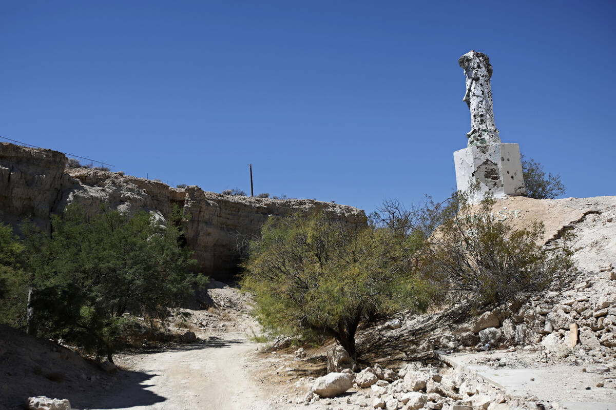 A statue of Christ without his head stands in Cathedral Canyon, outside of Pahrump, Thursday, S ...