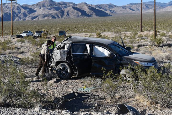 Special to the Pahrump Valley Times A Nye County Sheriff's Office deputy and an NHP Trooper exa ...