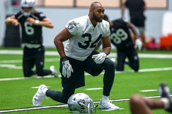 Raiders linebacker KJ Wright (34) stretches during team practice at the Raiders Headquarters at ...