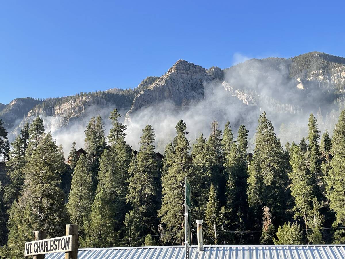 Smoke can be seen from a fire that damaged the lodge at Mount Charleston on Friday, Sept. 27, 2 ...