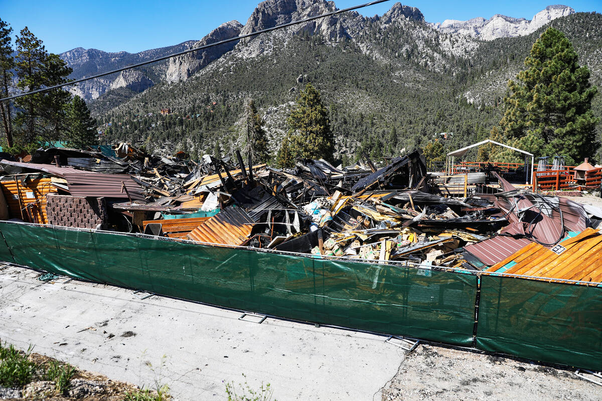 Debris of the former Mount Charleston Lodge is fenced off on Monday, Sept. 20, 2021. (Rachel As ...