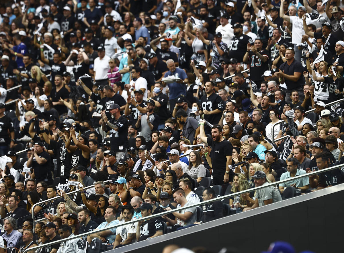 Raiders fans cheer during the first half of NFL game against the Miami Dolphins at Allegiant St ...