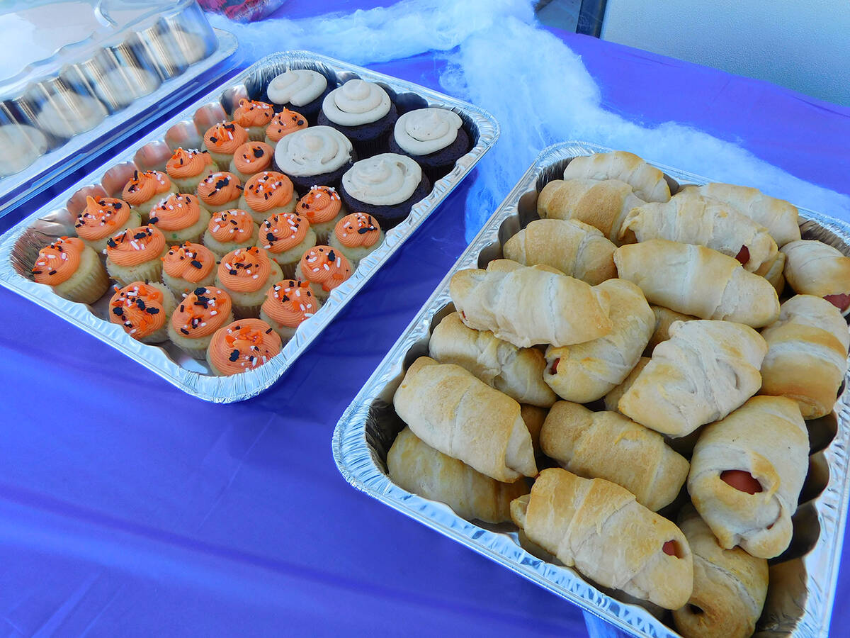 Robin Hebrock/Pahrump Valley Times Pigs in a blanket, cupcakes and more were set out for attend ...