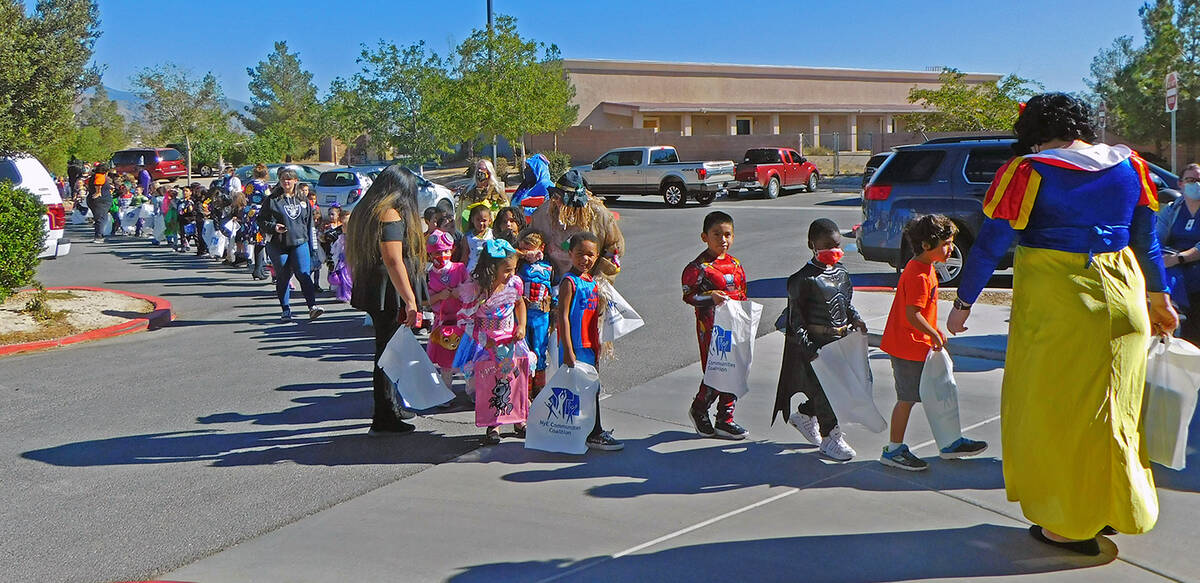 Robin Hebrock/Pahrump Valley Times A long line of students from J.G. Johnson Elementary can be ...