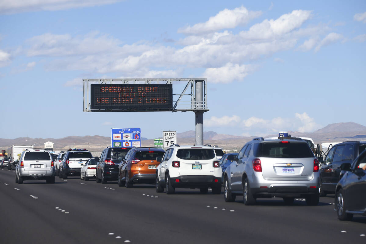 Traffic backs up on Interstate 15 as Electric Daisy Carnival attendees approach Speedway Boulev ...