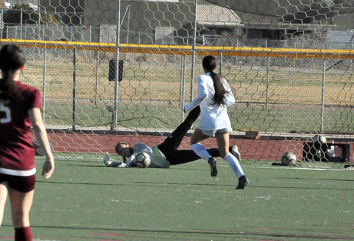 Horace Langford Jr./Pahrump Valley Times Freshman keeper Avery Moore dives to make a save durin ...
