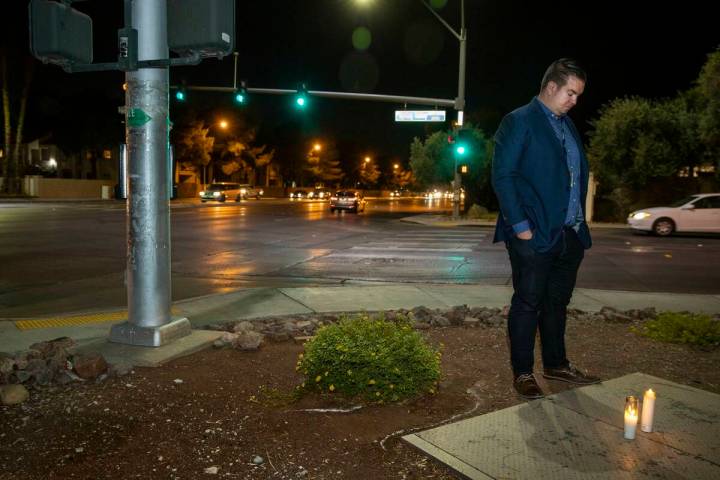 Andrew Bennett, public information officer with Zero Fatalities, stands after leaving a candle ...