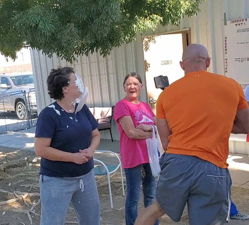 Special to the Pahrump Valley Times A Desert Haven Animal Society representative receives a pie ...