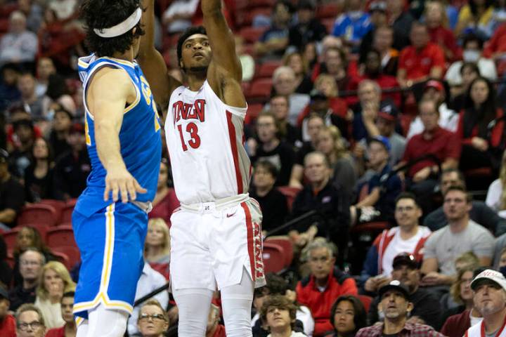 UNLV Rebels guard Bryce Hamilton (13) shoots against UCLA Bruins guard Jaime Jaquez Jr. (24) du ...