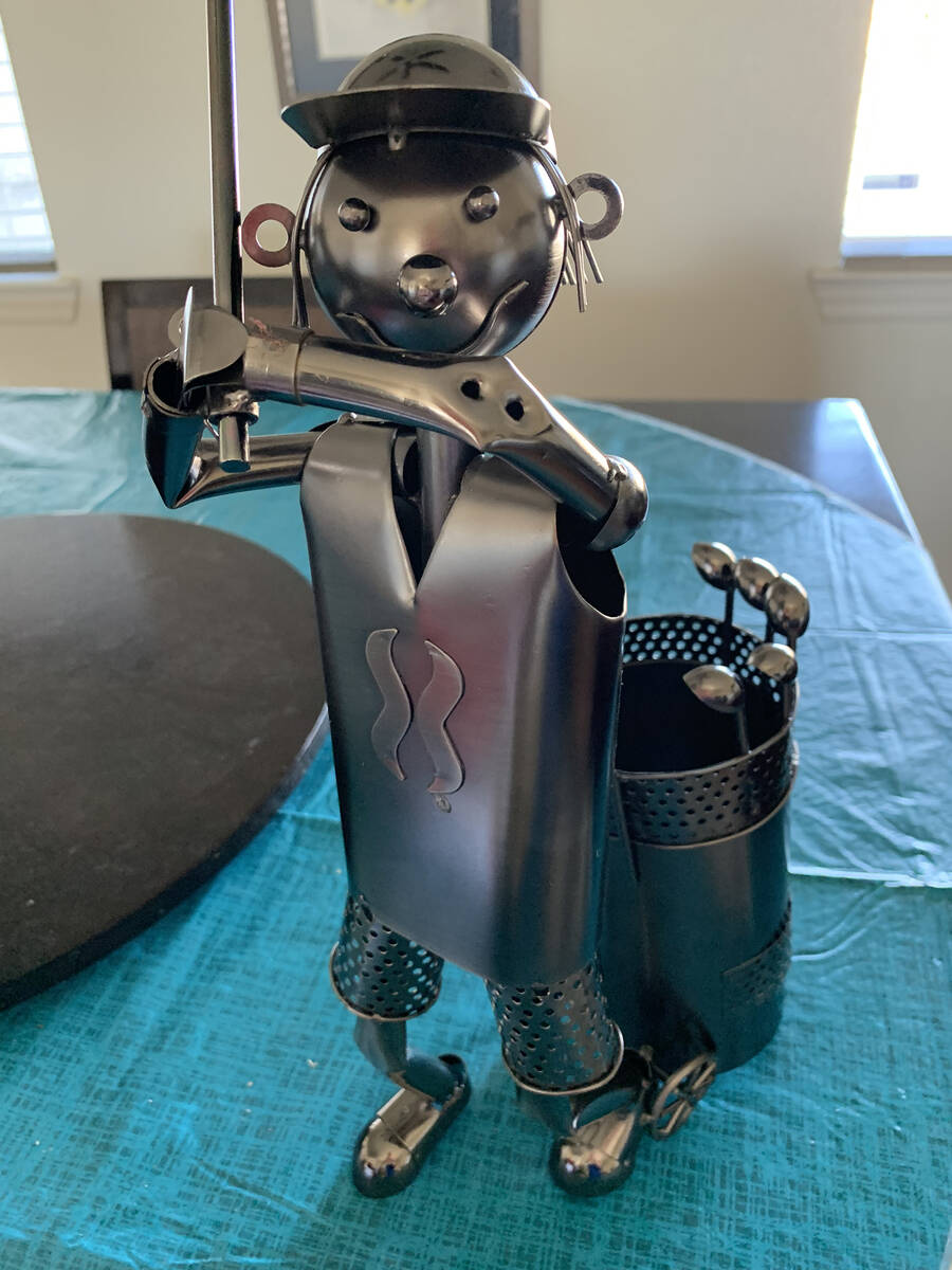 Special to the Pahrump Valley Times A golf-themed wine bottle holder is another of the more tha ...