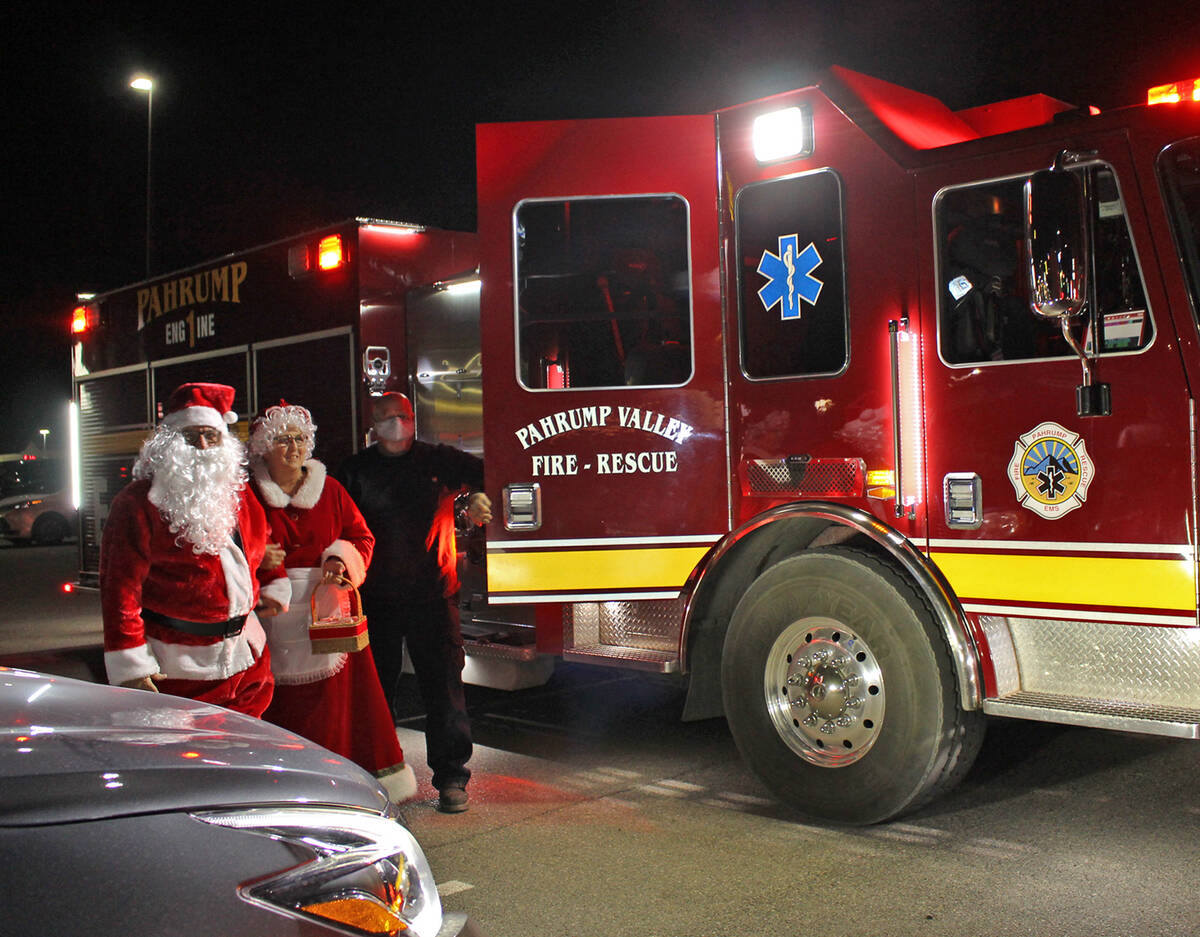 Robin Hebrock/Pahrump Valley Times Santa and Mrs. Claus were given a very special transport to ...