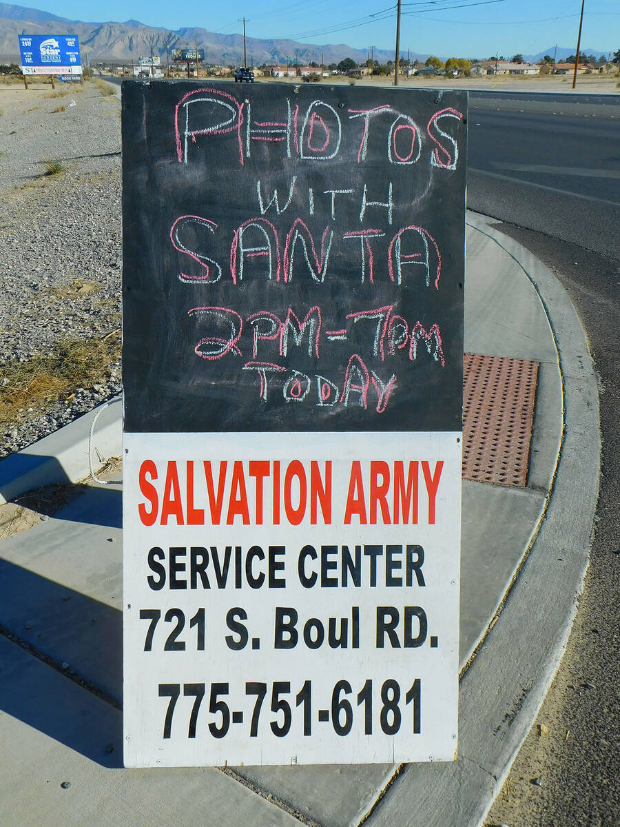 Robin Hebrock/Pahrump Valley Times A sign announcing a Photos with Santa opportunity will be pl ...