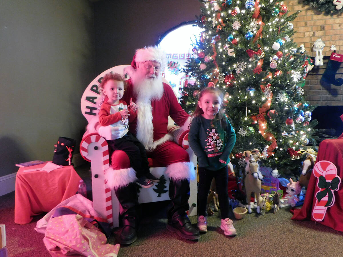 Robin Hebrock/Pahrump Valley Times Santa Claus spent much of the last weekend at the Salvation ...