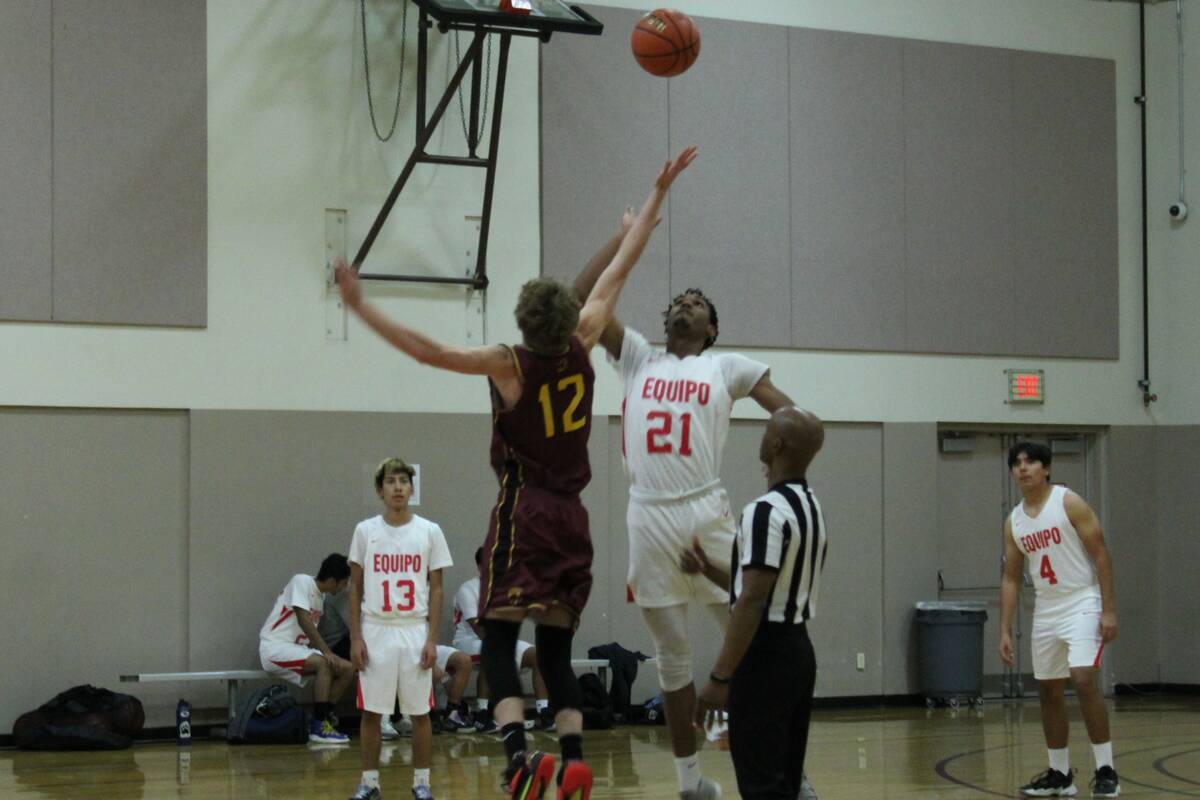 Danny Smyth/Pahrump Valley Times. Pahrump Valley forward Syblue Glisson (12) going for the jump ...