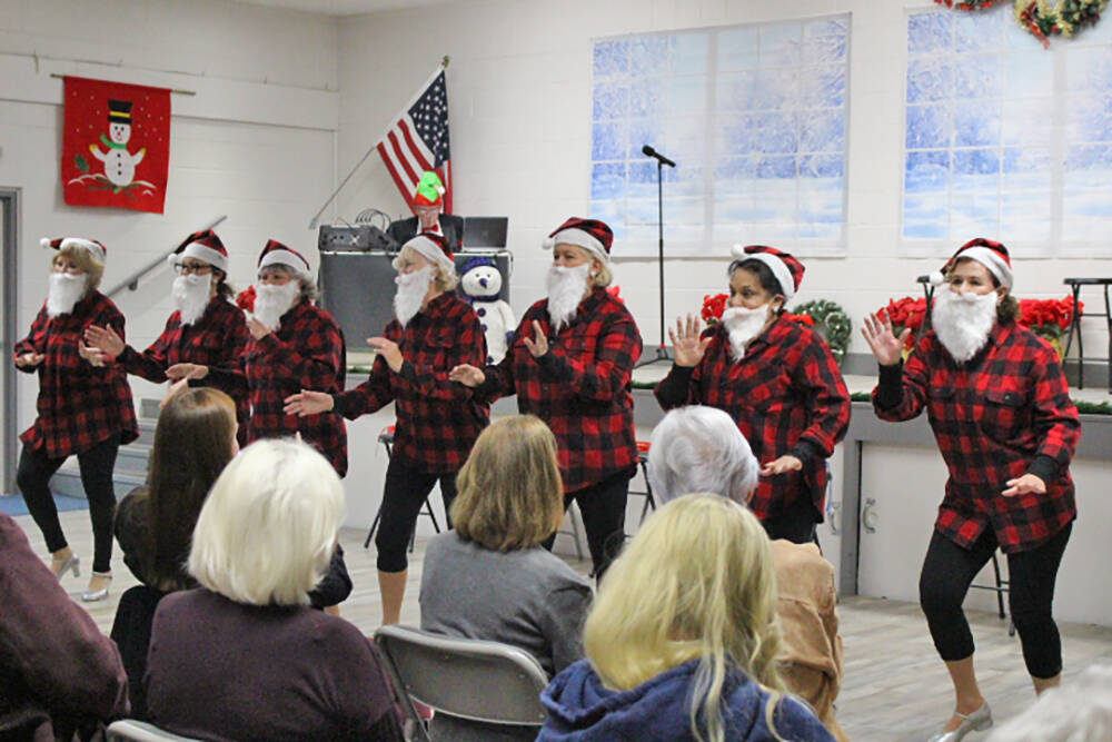 Robin Hebrock/Pahrump Valley Times The Silver Tappers dance to "Boogie Woogie Santa" at the Chr ...