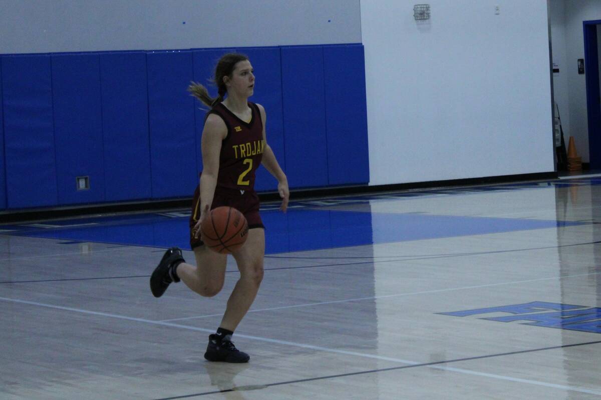 Danny Smyth/Pahrump Valley Times Senior guard Tayla Wombaker (2) dribbling the ball up the cour ...