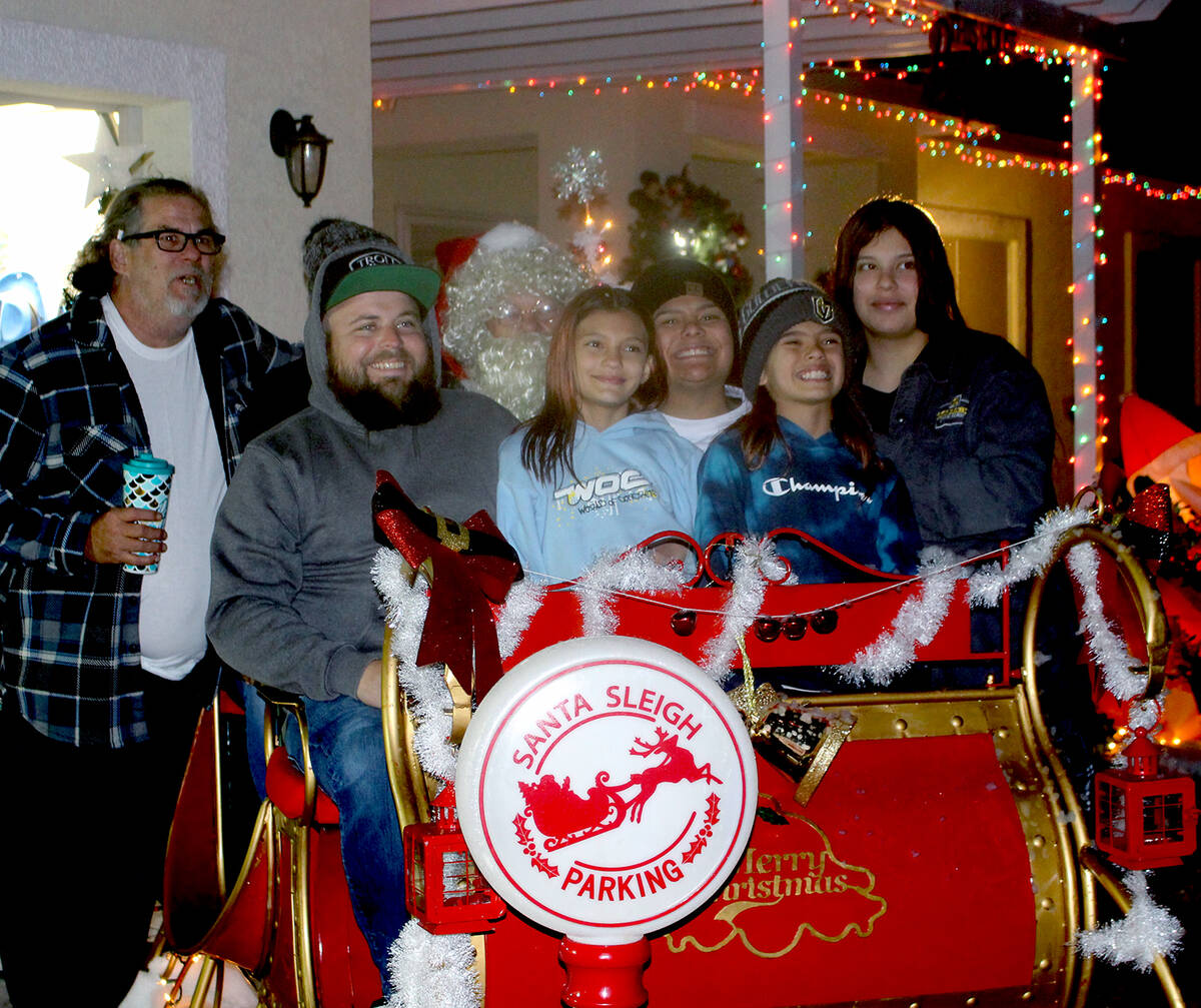 Robin Hebrock/Pahrump Valley Times Packed into the sleigh, a Pahrump family captures some photo ...