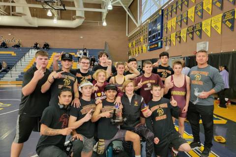 Special to the Pahrump Valley Times The Pahrump Valley Trojans wrestling team celebrating after ...