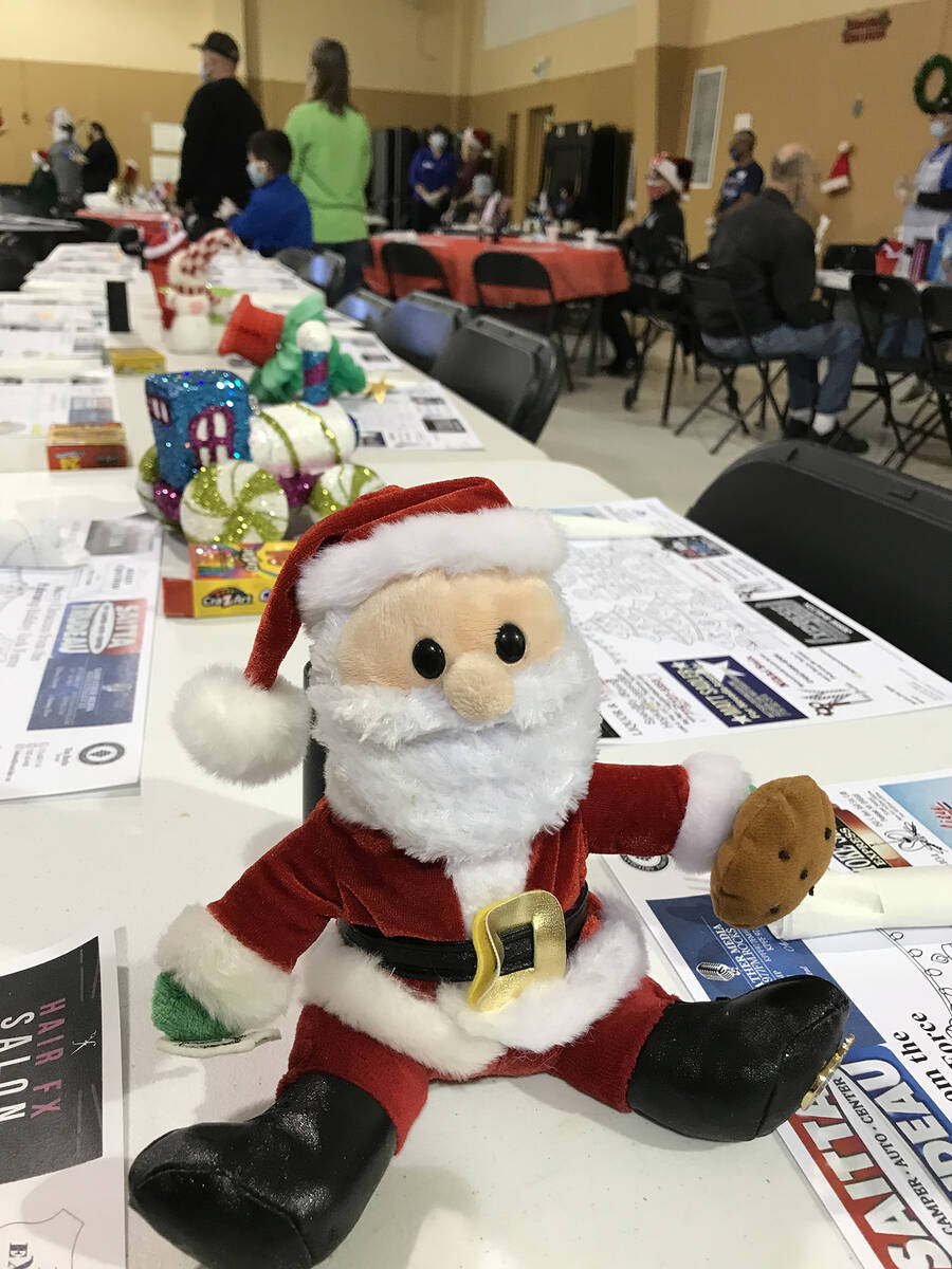 Robin Hebrock/Pahrump Valley Times The tables were decorated with holiday items during the Comm ...