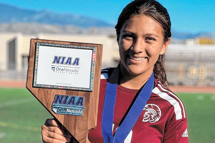 Special to the Pahrump Valley Times/ Kailani Martinez holding up the 3A Nevada State Championsh ...