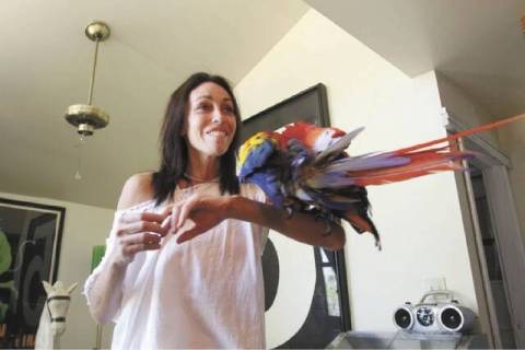 Heidi Fleiss shown with one of her exotic birds. The former "Hollywood Madam" who has called Pa ...