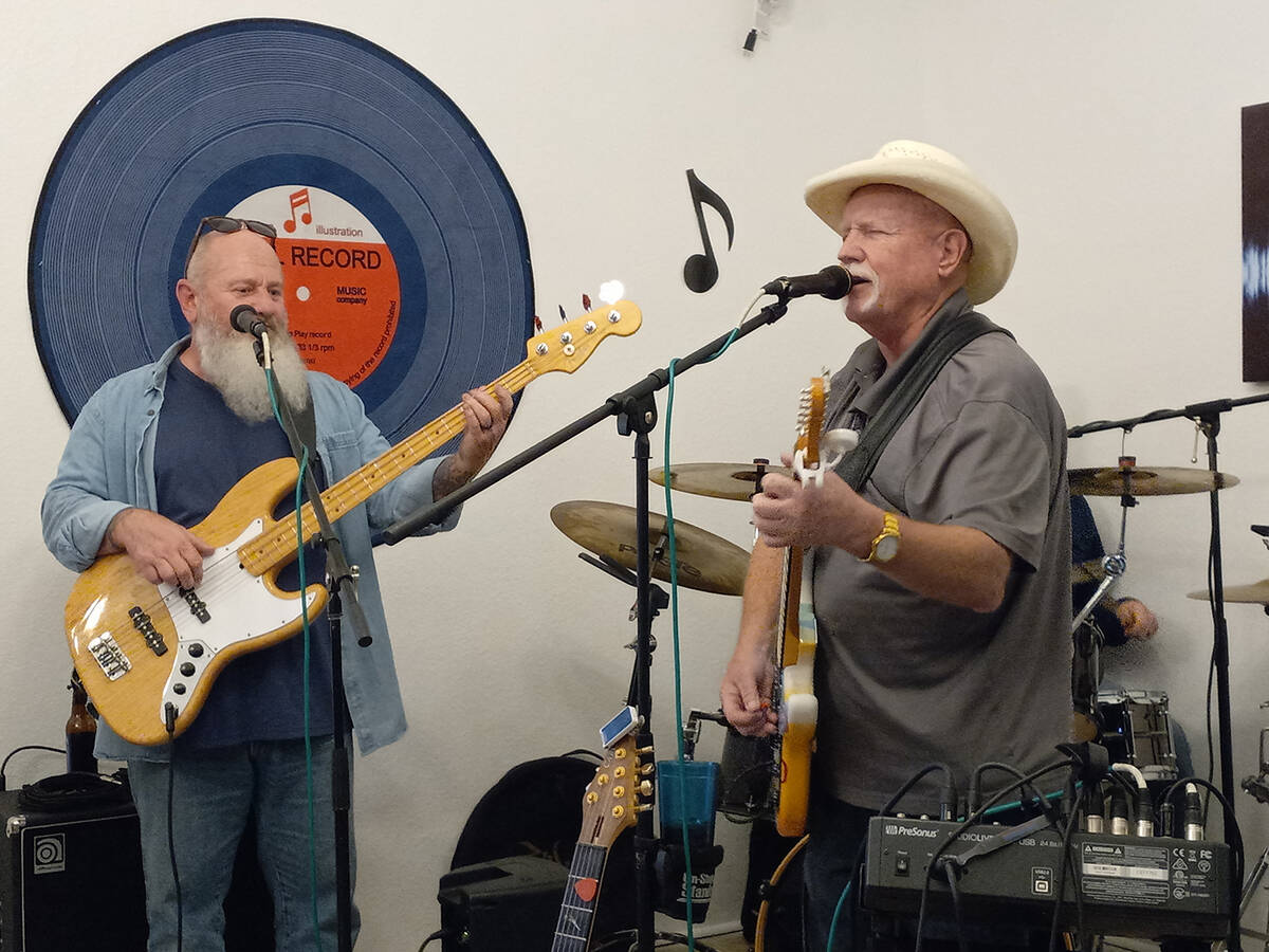 Selwyn Harris/Pahrump Valley Times Musician Mike Hickey, at right, belts out a tune during Sund ...