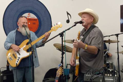 Selwyn Harris/Pahrump Valley Times Musician Mike Hickey, at right, belts out a tune during Sund ...
