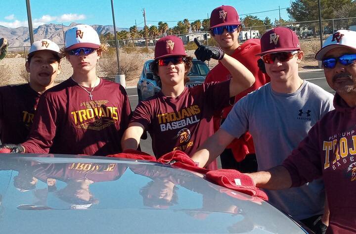 Special to the Pahrump Valley Times/ Pahrump Valley Trojans baseball coach Roy Uyeno, far right ...