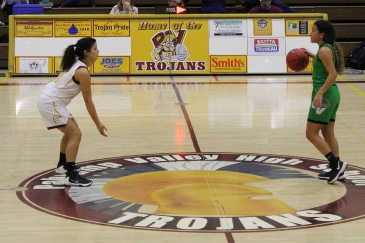 Danny Smyth/Pahrump Valley Times Helianne Sutton defends a Virgin Valley player during their ga ...