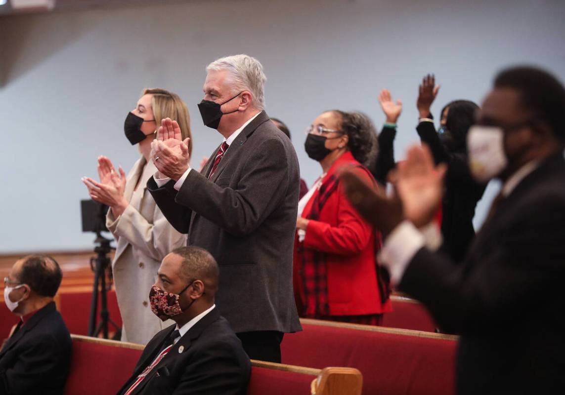 Gov. Steve Sisolak applauds along with the congregation during a service honoring Dr. Martin Lu ...