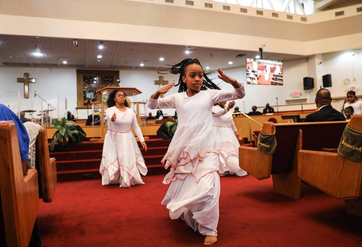 Olivia Dillard, 8, performs alongside her fellow Las Vegas Unity Dancers during a service honor ...