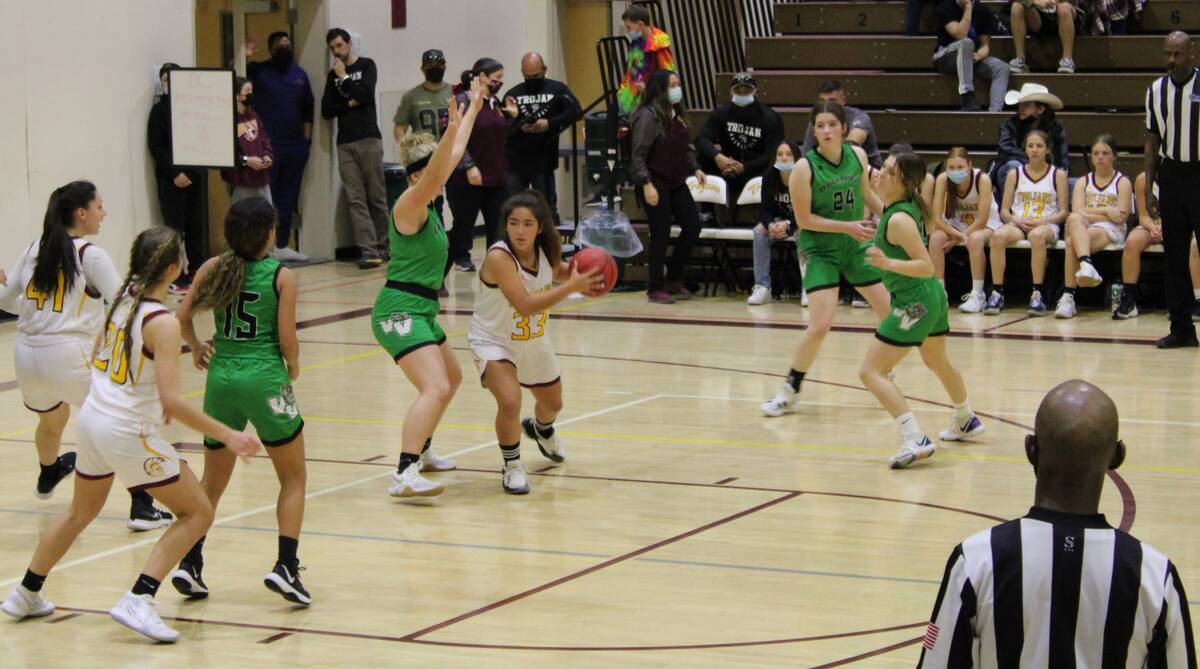 Danny Smyth/Pahrump Valley Times Pahrump Valley guard Paris Coleman (33) looking to pass the ba ...