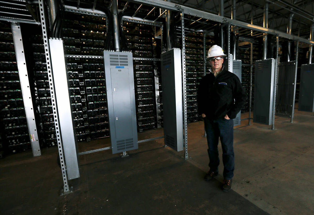 Rick Tabish is seen in March 2019 at a cryptocurrency mining complex south of Butte, Montana. T ...