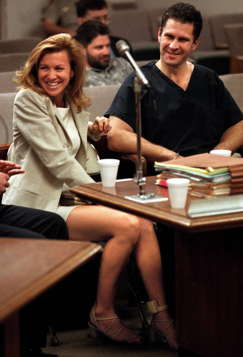 Sandy Murphy, sitting beside co-defendant Rick Tabish in Justice Court in August 1999, wears a ...