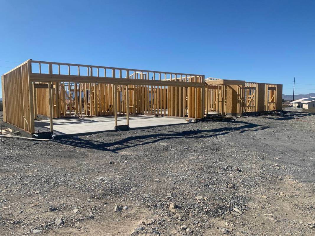 A home under construction on Acoma Avenue in Pahrump, where home prices have climbed more than ...