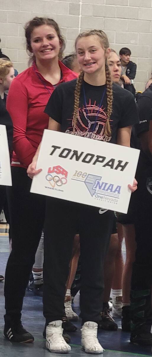 Tonopah High School wrestlers Kaya Cobb (back) and Montana Strozzi (front) at the first NIAA Al ...