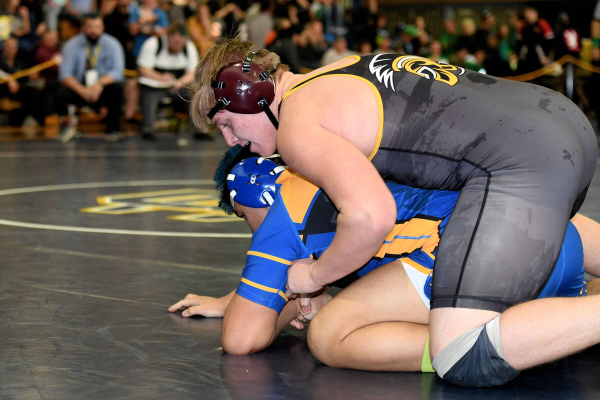 Tannor Hanks, wrestling in the 220-pound division.