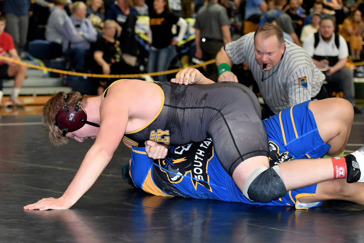 Tannor Hanks, wrestling in the 220-pound division.