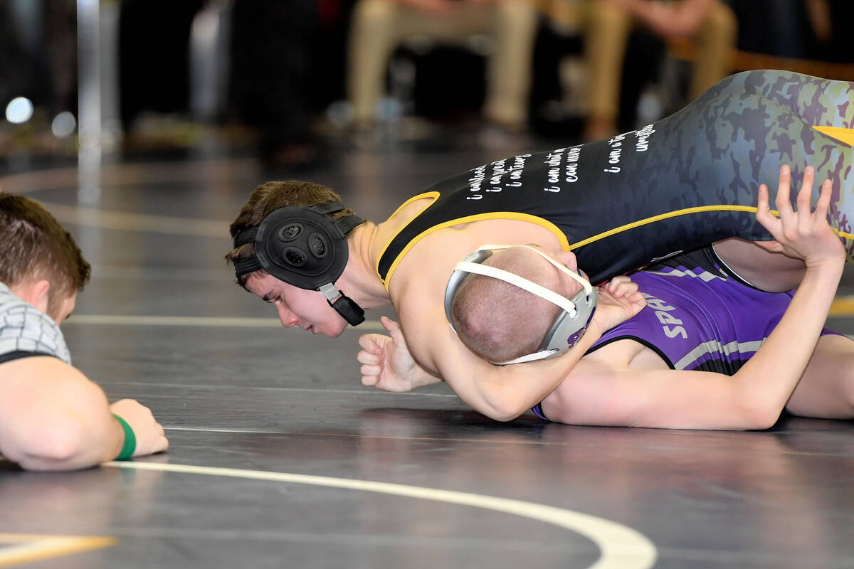 Kyle Heaney, wrestling in the 106-pound division.