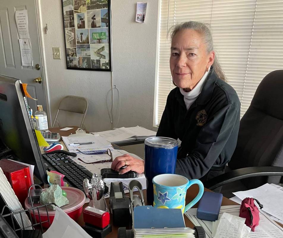 Lucy Allen, a dispatcher and accountant at Integrity Taxi, takes calls at her desk in Pahrump. ...