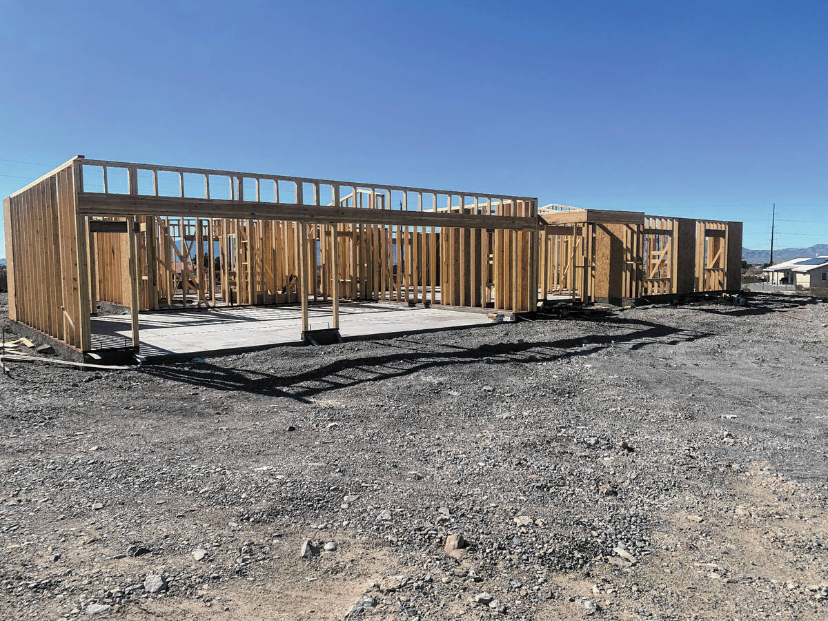A home under construction on Acoma Avenue in Pahrump, where home prices have climbed more than ...