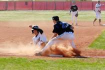 Horace Langford Jr./Pahrump Valley Times Senior Zack Cuellar sliding into third base during the ...