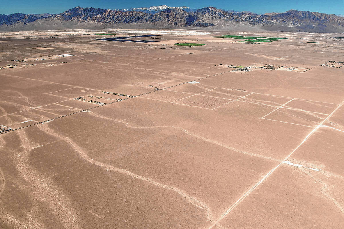 The lines visible in the dirt from this aerial shot of the Amargosa Desert are underground wate ...