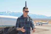 Executive Director Amargosa Conservancy Mason Voehl discusses the flight path to a group of pas ...