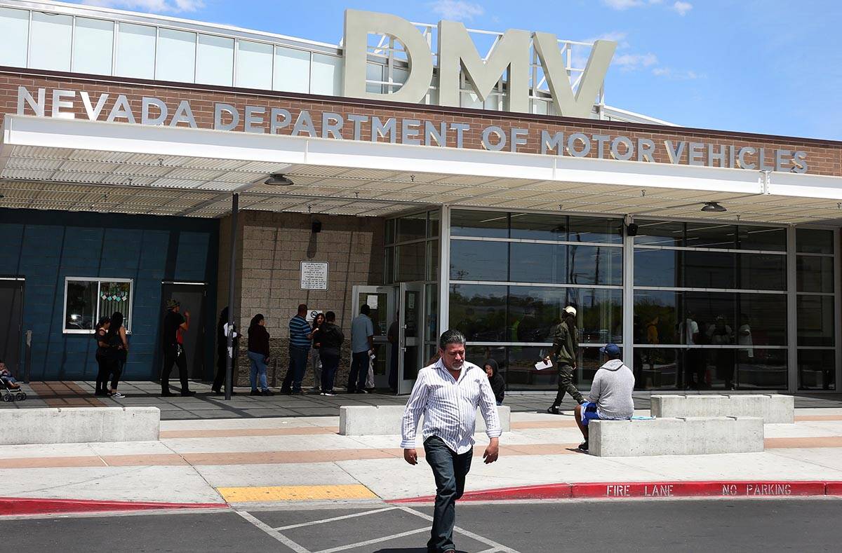 A customer walks past the DMV at Sahara office on Friday, May 10, 2019, in Las Vegas. (Bizuayeh ...